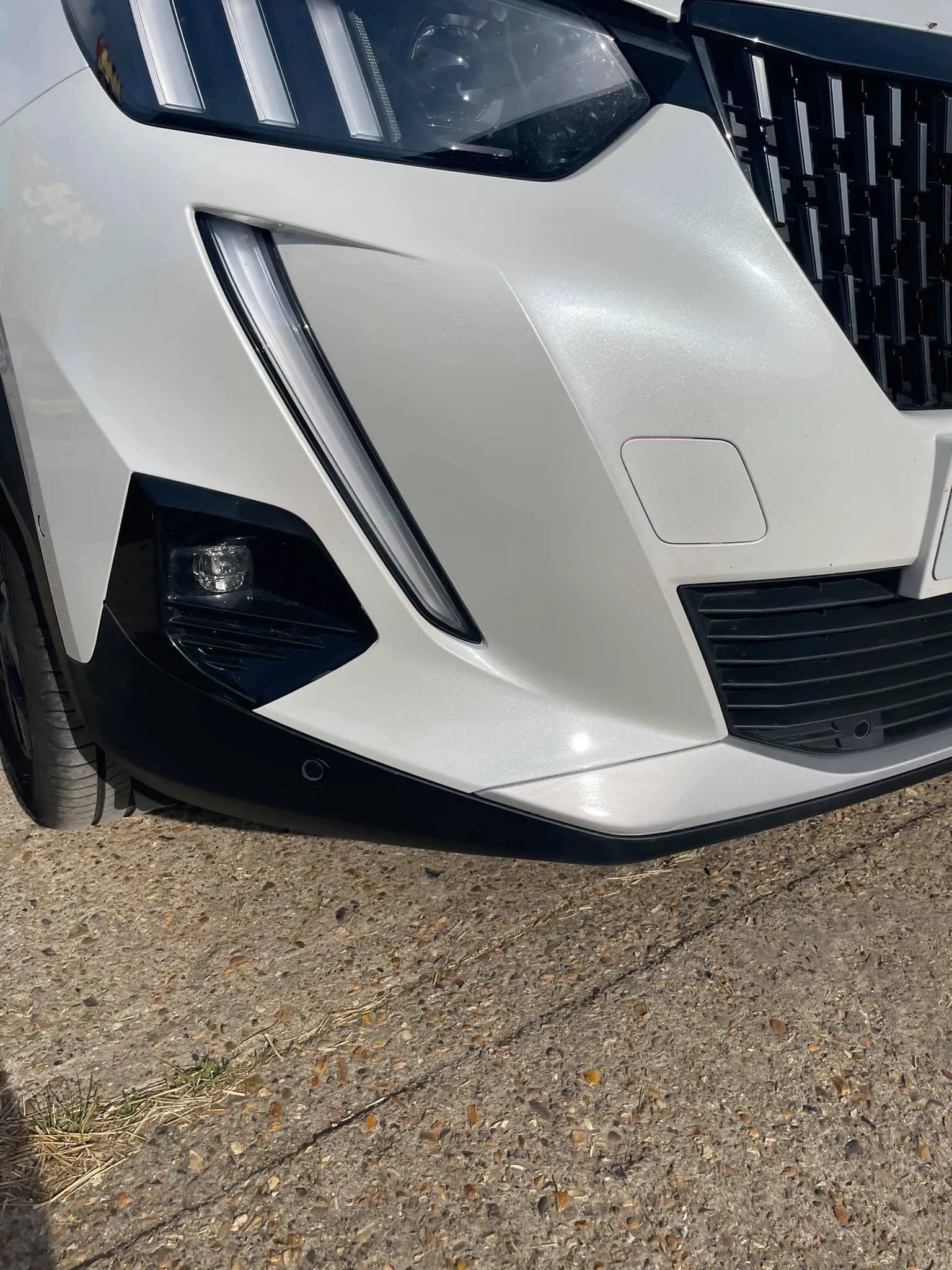 A close up of the front of a car.